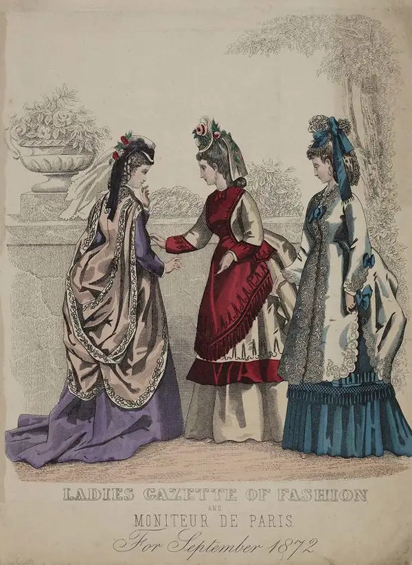 Three women in Victorian Fashion of 1870s in a garden setting