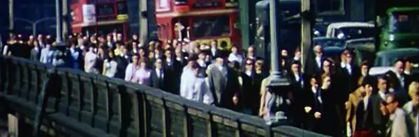 Still from the film 'The Living City' showing commuters on London Bridge, 1970